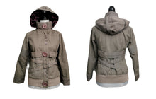 Load image into Gallery viewer, WOMEN SIZE SMALL - SCHWIING Unique Fitted, Hooded Jacket EUC 
Very stylish jacket. Small faint stain on cuff.  Would be perfect for teen girl too. Well made!  Zipper, Hood, snap buttons. Sage colour. 
100% COTTON, no stretch at all.  Displayed on size medium mannequin for reference.
