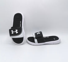 Load image into Gallery viewer, BOY SIZE 1 YOUTH - UNDER ARMOUR SLIDES VGUC

Soft foam cushion. 

Gentle signs of wear - Please review all pictures. 

