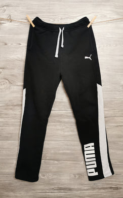 BOY SIZE XL (14/16 YEARS) PUMA SOFT KNIT JOGGER VGUC

Stylish, warm and cozy black and white sweatpants.  

Small marks on white parts of legs (see pics for reference)

Slightly faded black 

