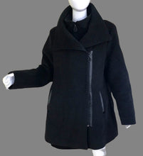 Load image into Gallery viewer, WOMENS PLUS SIZE 16P - NIKKI JONES COLLECTION, ASYMMETRICAL WOOL / CASHMERE BLEND PEA COAT EUC

Beautiful dark Heather grey, made in Canada. Stunning wool jacket! 

This would best fit a plus size 14/16 (smaller fitting in my opinion) 

